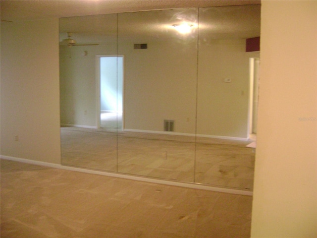 3077 Casa Del Sol Cir Unit 207, Clearwater, FL 33761 - interior space featuring a closet and baseboards