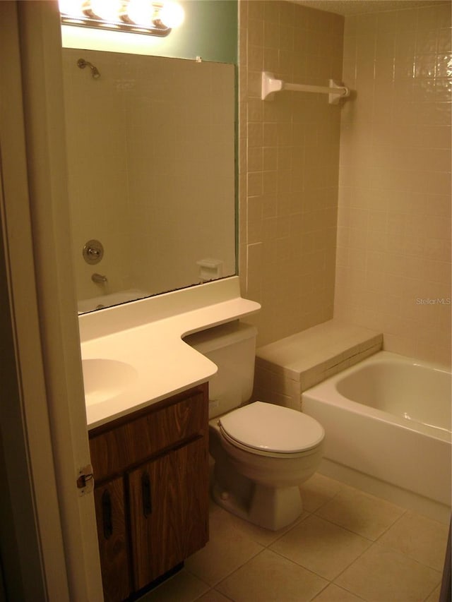3077 Casa Del Sol Cir Unit 207, Clearwater, FL 33761 - bathroom with tile patterned floors, vanity, toilet, and  shower combination