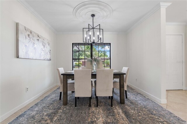 4706 Fox Hunt Dr, Tampa, FL 33624 - dining space featuring ornamental molding, tile patterned floors, a chandelier, and baseboards