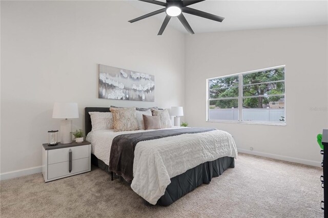 4706 Fox Hunt Dr, Tampa, FL 33624 - bedroom featuring carpet, baseboards, and ceiling fan
