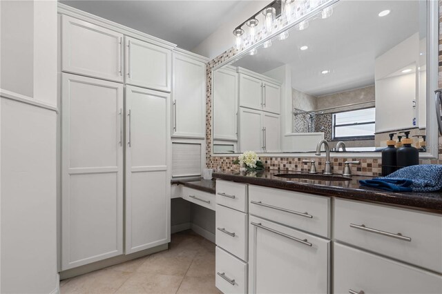 4706 Fox Hunt Dr, Tampa, FL 33624 - full bath with vanity, backsplash, tile patterned floors, a shower, and recessed lighting
