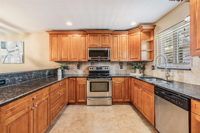 2016 Chelam Way, Brandon, FL 33511 - kitchen featuring stainless steel appliances, a sink, brown cabinetry, tasteful backsplash, and recessed lighting