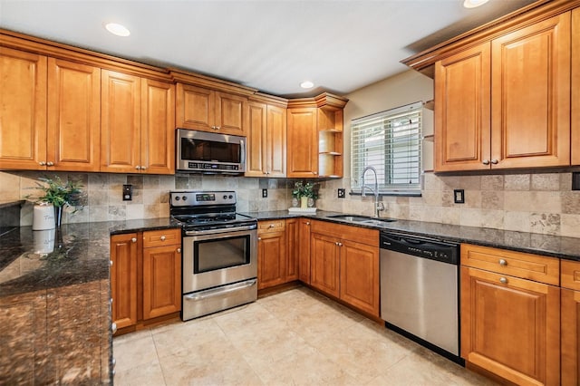 2016 Chelam Way, Brandon, FL 33511 - kitchen featuring stainless steel appliances, a sink, brown cabinetry, and recessed lighting