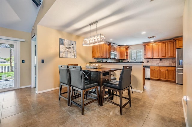 2016 Chelam Way, Brandon, FL 33511 - dining space with baseboards, light tile patterned flooring, and recessed lighting