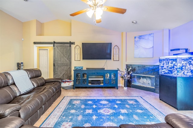 2016 Chelam Way, Brandon, FL 33511 - living area with a barn door, a high end fireplace, lofted ceiling, and a ceiling fan