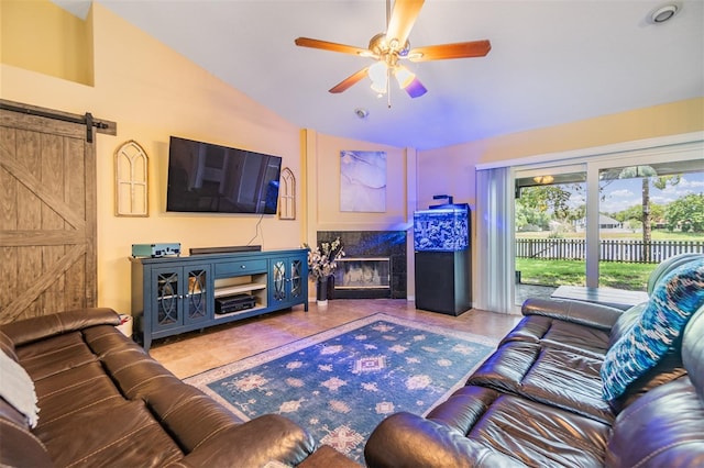 2016 Chelam Way, Brandon, FL 33511 - living room with lofted ceiling, a barn door, and ceiling fan
