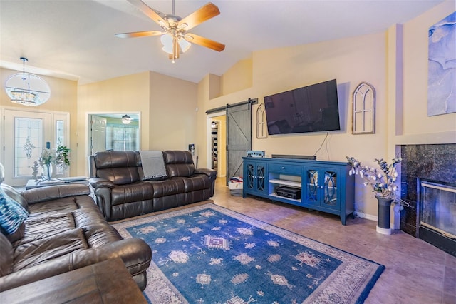 2016 Chelam Way, Brandon, FL 33511 - tiled living area featuring a barn door, ceiling fan, vaulted ceiling, baseboards, and a fireplace