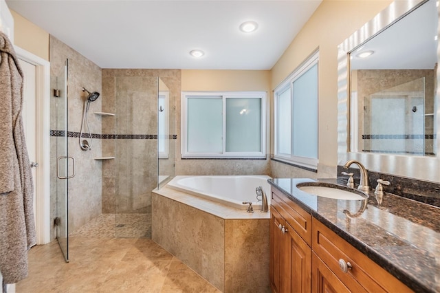 2016 Chelam Way, Brandon, FL 33511 - bathroom featuring a shower stall, a bath, and vanity