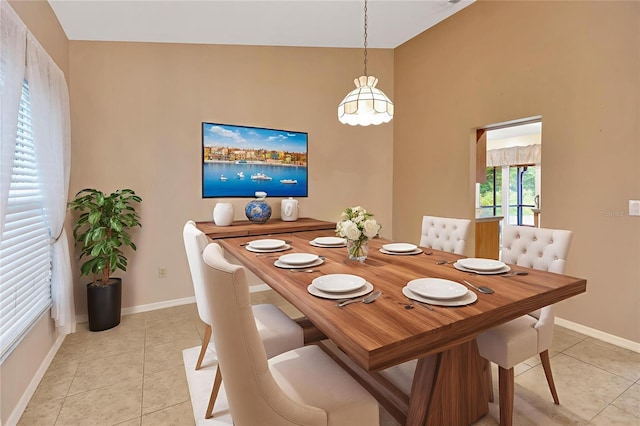 1604 Comfy Ct, Sun City Center, FL 33573 - dining room featuring light tile patterned floors and baseboards