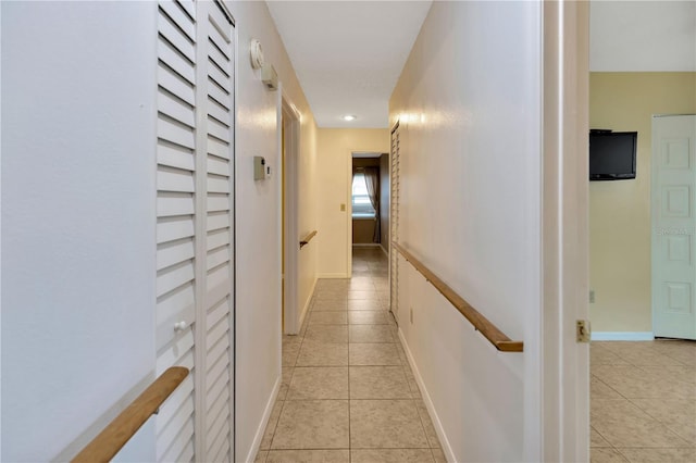 1604 Comfy Ct, Sun City Center, FL 33573 - corridor featuring light tile patterned floors and baseboards