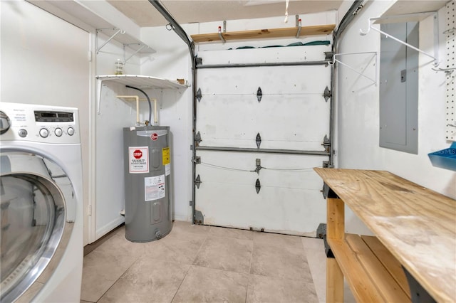 1604 Comfy Ct, Sun City Center, FL 33573 - laundry area with washer / clothes dryer, electric water heater, electric panel, a garage, and light tile patterned flooring