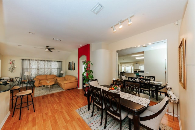 9852 Laurel Ledge Dr, Riverview, FL 33569 - dining room with light wood finished floors and a ceiling fan