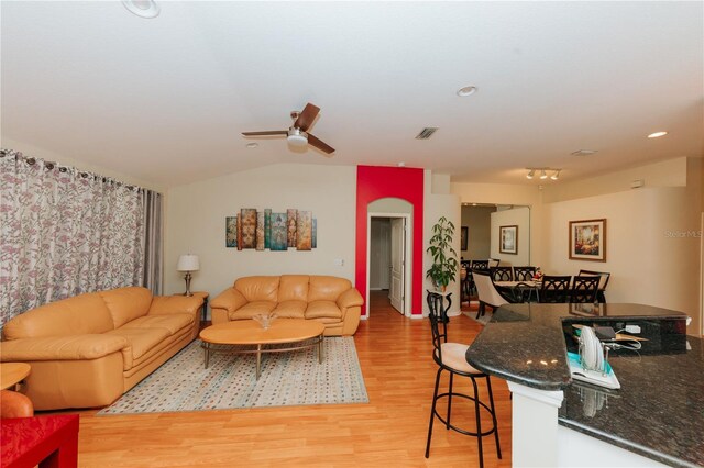 9852 Laurel Ledge Dr, Riverview, FL 33569 - living area featuring light wood-type flooring, lofted ceiling, ceiling fan, and recessed lighting