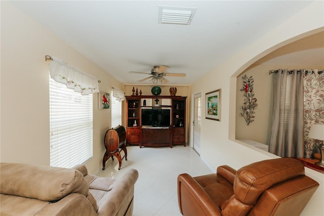 9852 Laurel Ledge Dr, Riverview, FL 33569 - living area with ceiling fan and arched walkways