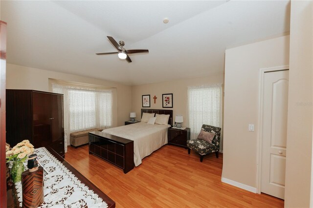 9852 Laurel Ledge Dr, Riverview, FL 33569 - bedroom with light wood-style flooring, a ceiling fan, and lofted ceiling