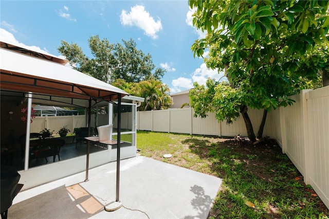 9852 Laurel Ledge Dr, Riverview, FL 33569 - fenced backyard with a gazebo and a patio
