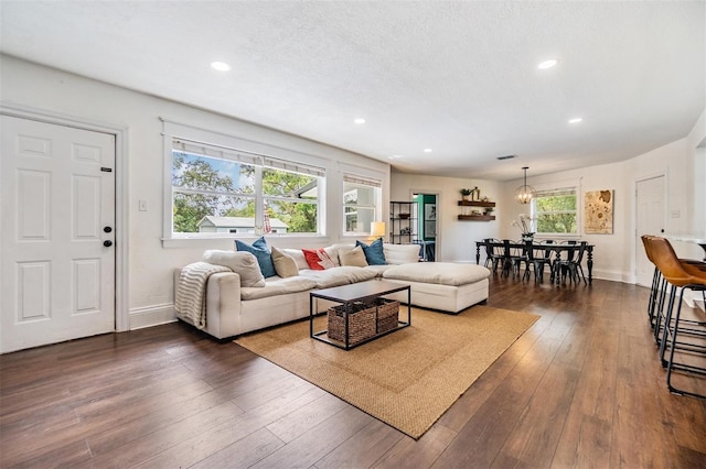 3120 S Polk Ave, Lakeland, FL 33803 - living area featuring dark wood-style flooring, recessed lighting, and baseboards