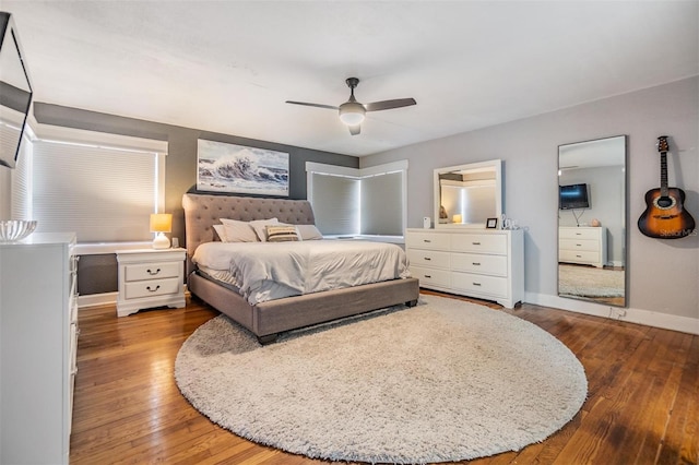 3120 S Polk Ave, Lakeland, FL 33803 - bedroom featuring wood finished floors, baseboards, and a ceiling fan
