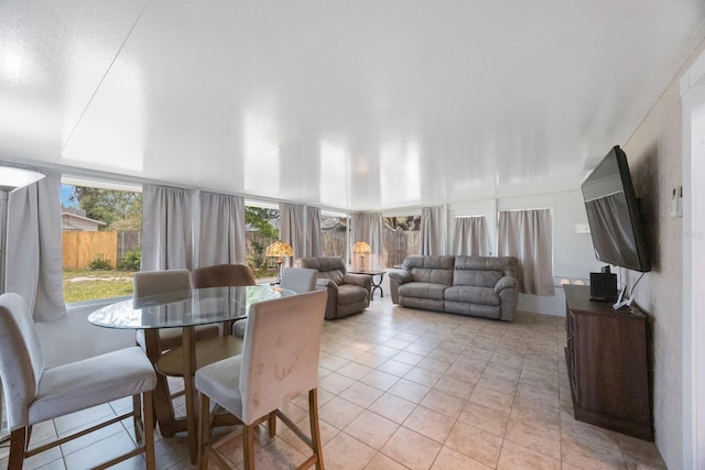 6639 Winding Oak Dr, Tampa, FL 33625 - dining area featuring light tile patterned floors