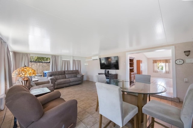 6639 Winding Oak Dr, Tampa, FL 33625 - living room with light tile patterned flooring and a wall mounted air conditioner