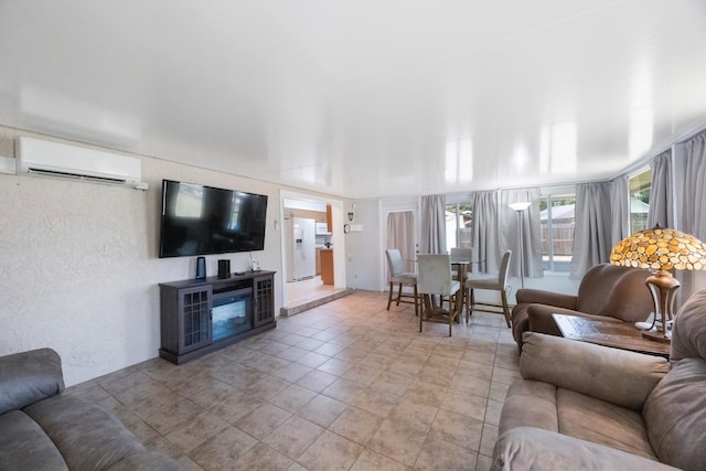 6639 Winding Oak Dr, Tampa, FL 33625 - living room featuring a wall unit AC and light tile patterned floors