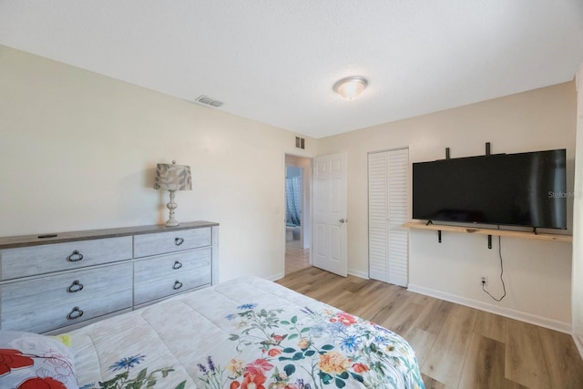 6639 Winding Oak Dr, Tampa, FL 33625 - bedroom featuring wood finished floors and baseboards