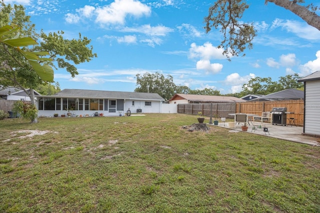 6639 Winding Oak Dr, Tampa, FL 33625 - view of yard with a sunroom and a patio area
