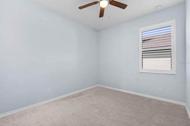 11016 Kiskadee Cir, New Port Richey, FL 34654 - empty room featuring carpet, ceiling fan, and baseboards