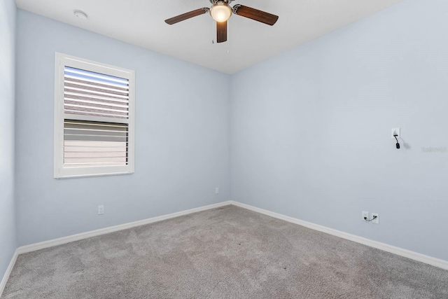 11016 Kiskadee Cir, New Port Richey, FL 34654 - carpeted spare room with ceiling fan, baseboards, and a smoke detector