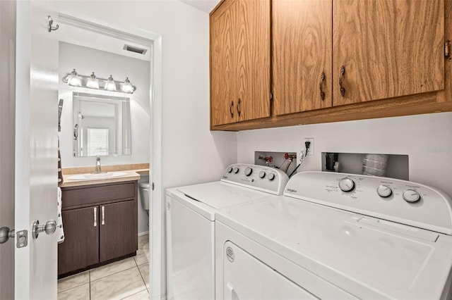 1410 Brighton Ct, Palm Harbor, FL 34684 - laundry area with washer and dryer and cabinet space
