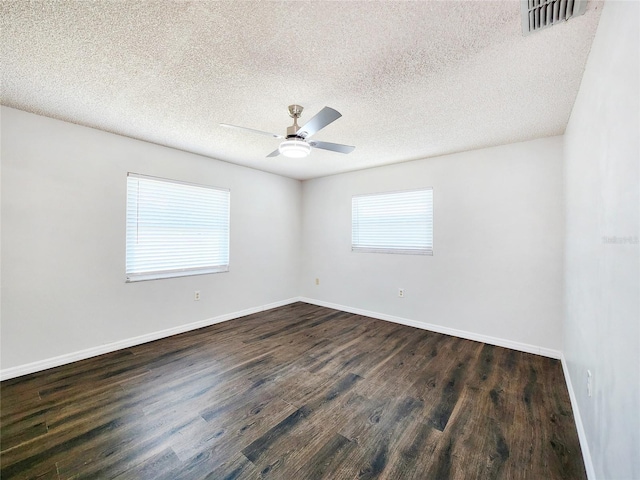 4102 Stonehenge Rd, Mulberry, FL 33860 - unfurnished room featuring dark wood-style floors, a ceiling fan, a textured ceiling, and baseboards