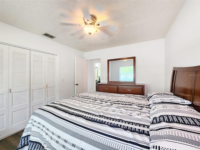 4102 Stonehenge Rd, Mulberry, FL 33860 - bedroom with a closet, a textured ceiling, and a ceiling fan