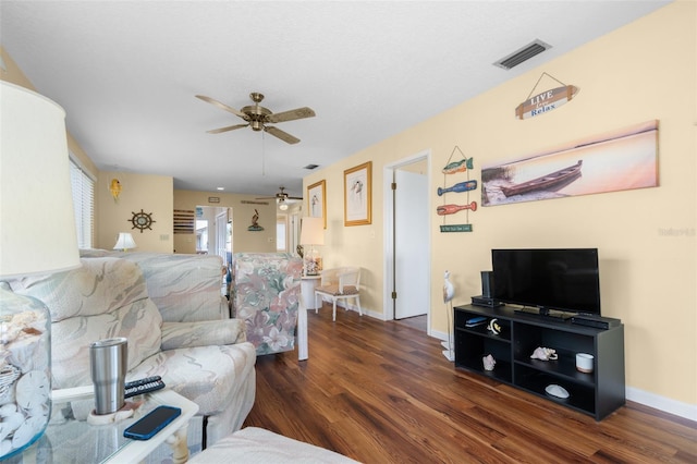 4036 Davit Dr, New Port Richey, FL 34652 - living area with a ceiling fan, wood finished floors, and baseboards