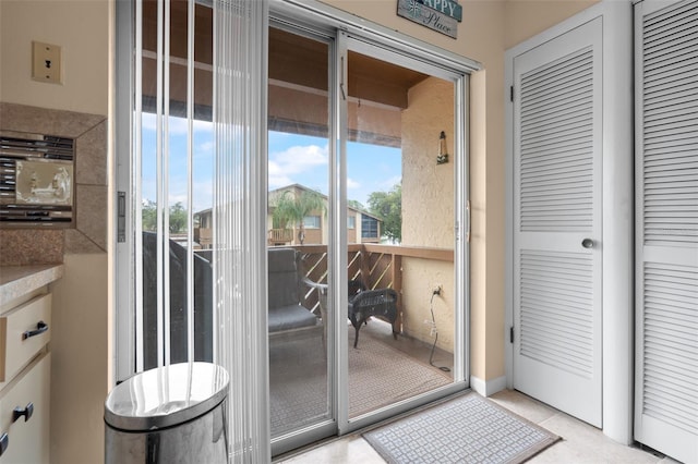 4036 Davit Dr, New Port Richey, FL 34652 - doorway with light tile patterned flooring