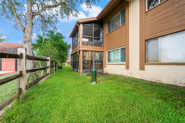 4036 Davit Dr, New Port Richey, FL 34652 - view of green lawn featuring a sunroom