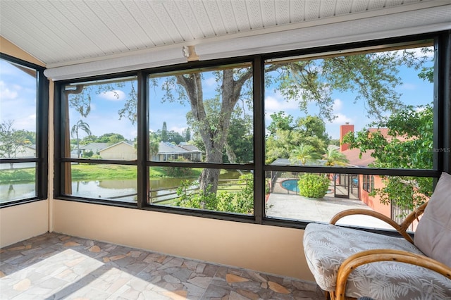 4036 Davit Dr, New Port Richey, FL 34652 - sunroom / solarium featuring stone tile floors