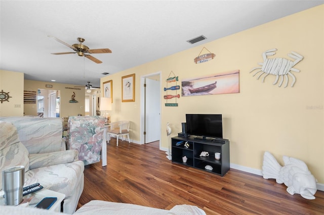 4036 Davit Dr, New Port Richey, FL 34652 - living room featuring wood finished floors, ceiling fan, and baseboards