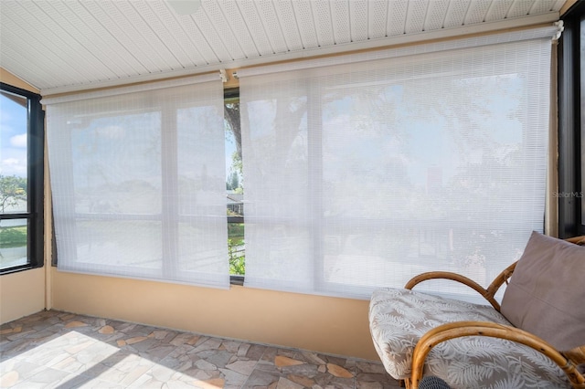 4036 Davit Dr, New Port Richey, FL 34652 - sunroom / solarium with stone tile floors