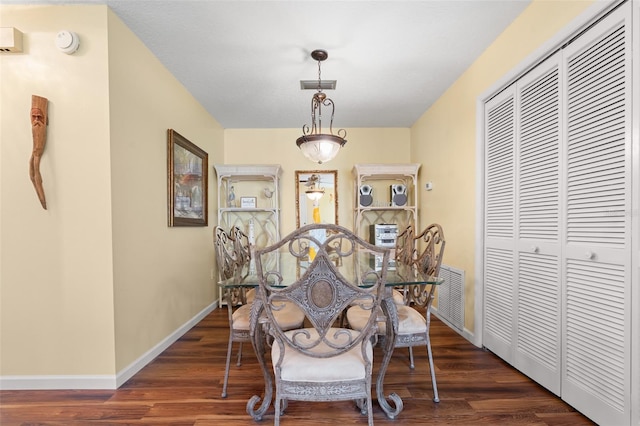 4036 Davit Dr, New Port Richey, FL 34652 - dining space featuring wood finished floors and baseboards