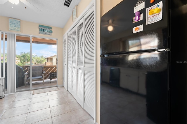 4036 Davit Dr, New Port Richey, FL 34652 - corridor featuring light tile patterned flooring