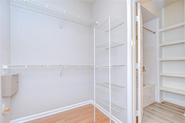 800 S Dakota Ave Unit 429, Tampa, FL 33606 - walk in closet with wood finished floors