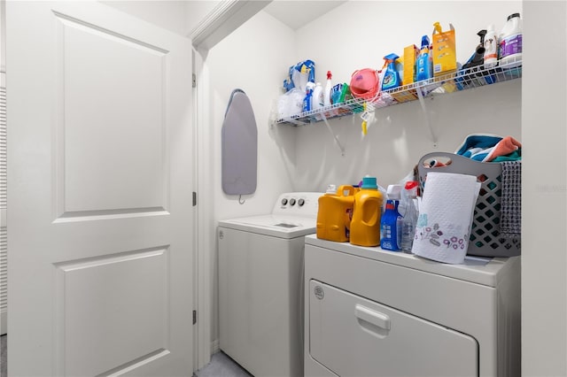 34248 Redwood Dawn Ln, Wesley Chapel, FL 33543 - washroom with washing machine and clothes dryer