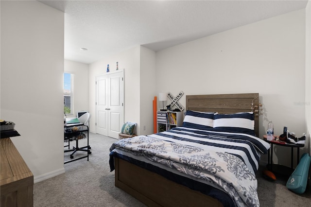 34248 Redwood Dawn Ln, Wesley Chapel, FL 33543 - carpeted bedroom featuring an office area and baseboards