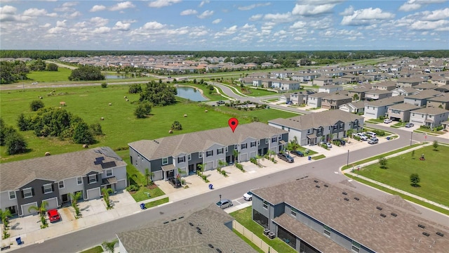 34248 Redwood Dawn Ln, Wesley Chapel, FL 33543 - aerial perspective of suburban area with a nearby body of water