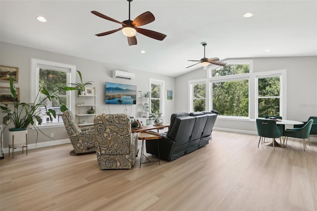 1709 Main St, Safety Harbor, FL 34695 - living area featuring a wall mounted AC, ceiling fan, light wood-style floors, healthy amount of natural light, and vaulted ceiling