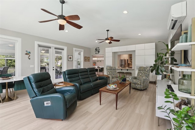 1709 Main St, Safety Harbor, FL 34695 - living area featuring ceiling fan, lofted ceiling, light wood-type flooring, a wall mounted air conditioner, and recessed lighting