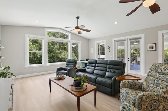 1709 Main St, Safety Harbor, FL 34695 - living area featuring ceiling fan, lofted ceiling, healthy amount of natural light, french doors, and light wood-style floors