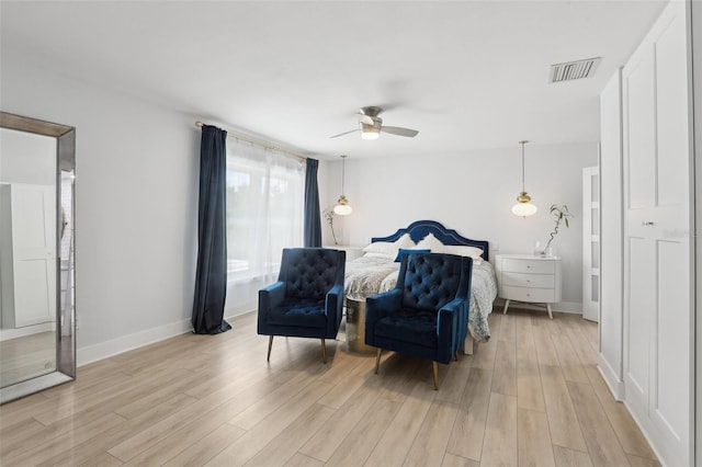 1709 Main St, Safety Harbor, FL 34695 - bedroom featuring light wood finished floors, baseboards, and a ceiling fan