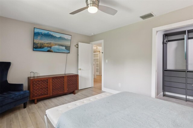 1709 Main St, Safety Harbor, FL 34695 - bedroom featuring wood finished floors, baseboards, and a ceiling fan