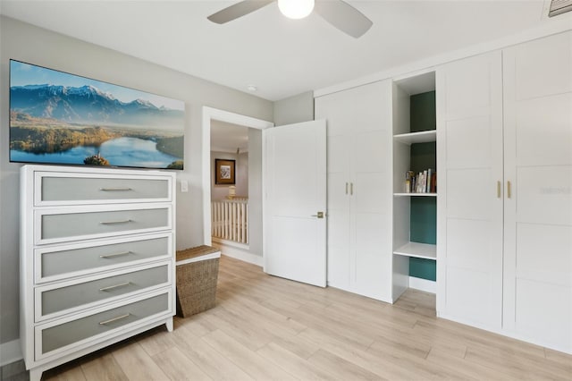 1709 Main St, Safety Harbor, FL 34695 - unfurnished bedroom with light wood-style floors and a ceiling fan